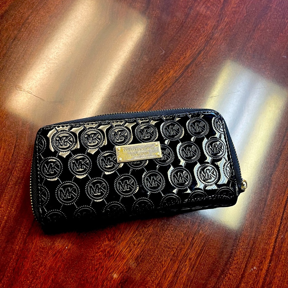 Michael Kors black patent wallet.